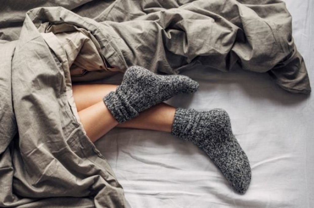 Pros and Cons of Sleeping With Socks On